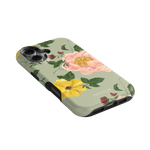 Garden Rose iPhone case featuring pink and yellow floral designs on a light green background.
