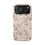 Grove iPhone case featuring a floral design with green vines and small blue flowers on a light pink background.