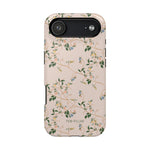 Grove iPhone case featuring a floral design with green leaves and blue flowers on a light pink background.