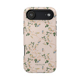 Grove iPhone case featuring a floral design with green leaves and blue flowers on a light pink background.