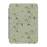 Grove Kindle case with a floral pattern in pastel colors on a light green background.