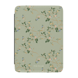 Grove Kindle case with a floral pattern in pastel colors on a light green background.
