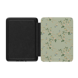 Grove Kindle case with a floral pattern and birds on a light green background, featuring a black interior.