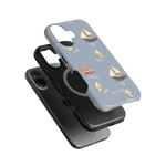 Harbor iPhone case featuring a light blue background with sailboat designs and a black phone case underneath.