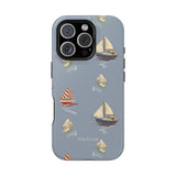 Harbor iPhone case featuring a light blue background with colorful sailboat patterns.