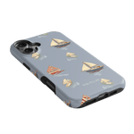 Harbor iPhone case featuring a light blue background with sailboat and nautical patterns.
