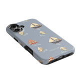 Harbor iPhone case featuring a light blue background with sailboat and nautical patterns.