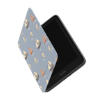Harbor Kindle case featuring a light blue design with sailboat patterns, partially open to show the device inside.