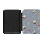 Harbor Kindle case featuring a blue background with sailboat patterns in red and cream colors, open view showing interior.