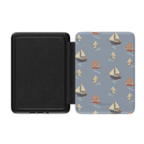 Harbor Kindle case featuring a blue background with sailboat patterns in red and cream colors, open view showing interior.