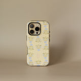 Haven personalized iPhone case with a floral pattern in yellow and blue on a cream background.
