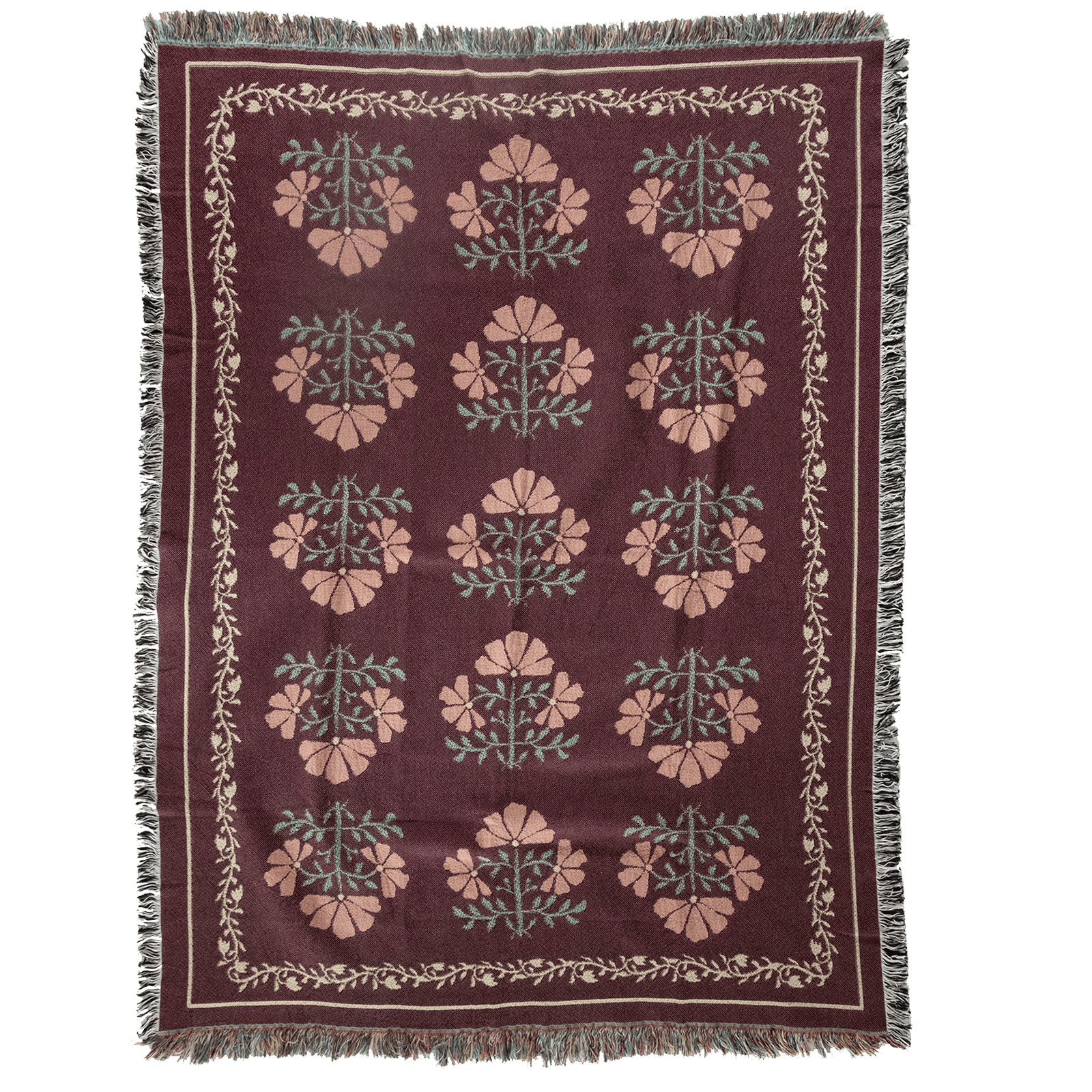 Haven woven blanket featuring a floral pattern in pink and green on a burgundy background with fringed edges.