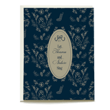 Heaven and Nature holiday card featuring a navy background with floral and bird designs, and the text "Let Heaven and Natu...