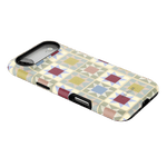 Heirloom iPhone case featuring a geometric pattern in pastel colors on a light background.