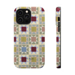 Heirloom iPhone case featuring a geometric pattern in muted colors with a matte finish and cutouts for buttons and camera.