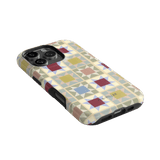Heirloom iPhone case featuring a geometric pattern in pastel colors with a matte finish and cutouts for camera and buttons.