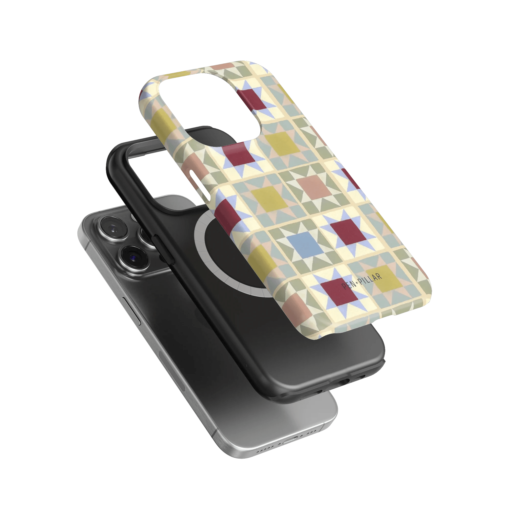 Heirloom iPhone case featuring a colorful geometric pattern, layered over a black phone case with a circular design.