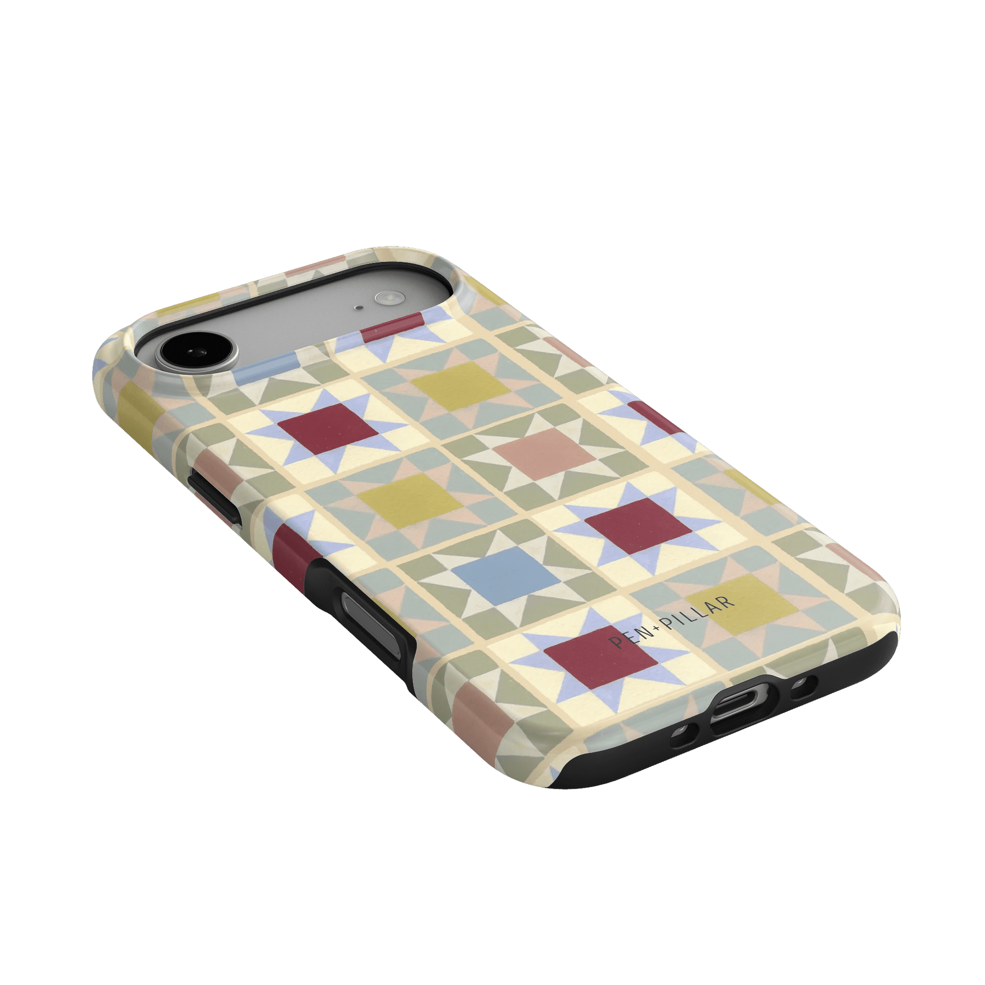 Heirloom iPhone case featuring a geometric pattern in pastel colors, angled view showing the camera cutout and buttons.
