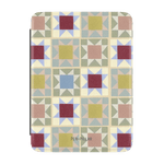 Heirloom Kindle case featuring a geometric patchwork design in muted colors, with a logo at the bottom.