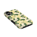 Hydrangea iPhone case featuring a yellow background with white hydrangea flowers and green leaves.