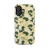 Hydrangea iPhone case featuring a yellow background with white hydrangea flowers and green leaves.