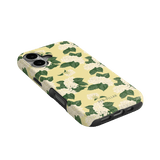 Hydrangea iPhone case featuring a yellow background with white hydrangea flowers and green leaves, angled view.