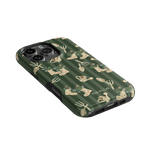 In the Garden iPhone case featuring a green background with floral and gardening tool patterns.