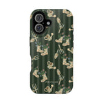 In the Garden iPhone case featuring a green striped background with floral and gardening tool patterns.