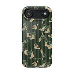 In the Garden iPhone case featuring a dark green background with gardening tools and floral patterns.