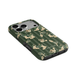 In the Garden iPhone case featuring a green background with floral and gardening-themed illustrations.