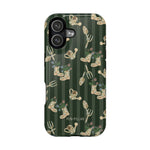 In the Garden iPhone case featuring a green striped background with gardening tools and floral designs.
