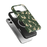 In the Garden iPhone case featuring a green background with floral and gardening tool designs, shown from multiple angles.