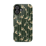 In the Garden iPhone case featuring a green background with gardening tools and floral designs.