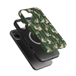 In the Garden iPhone case featuring a green background with floral and gardening tool patterns.