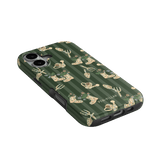 In the Garden iPhone case featuring a green background with floral and gardening-themed designs.