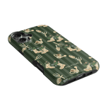 In the Garden iPhone case featuring a green background with floral and gardening tool illustrations.