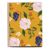 Jeanine blank card featuring a floral design with pink flowers and grapes on a mustard yellow background.