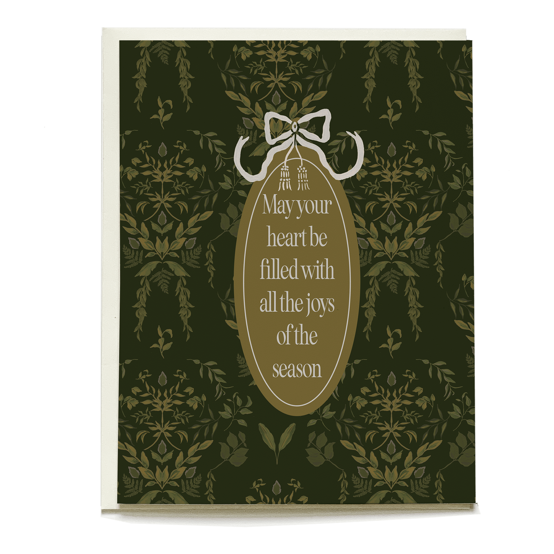 Laurel holiday card featuring a dark green floral pattern and a gold oval with the message, "May your heart be filled with...