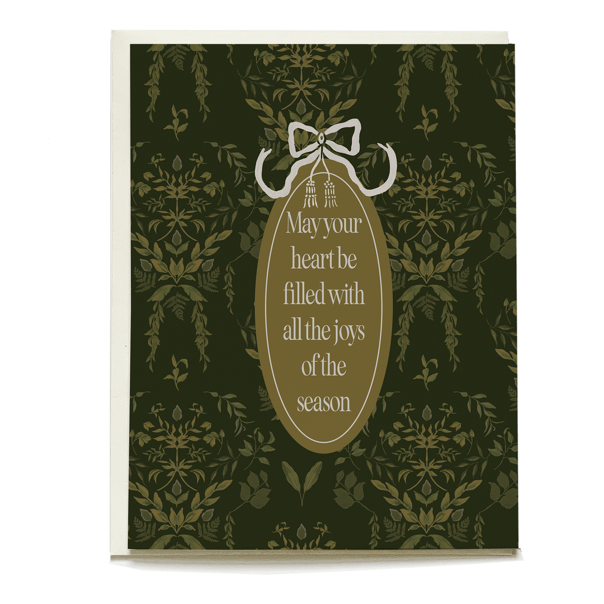 Laurel holiday card featuring a dark green floral pattern and a gold oval with the message, "May your heart be filled with...