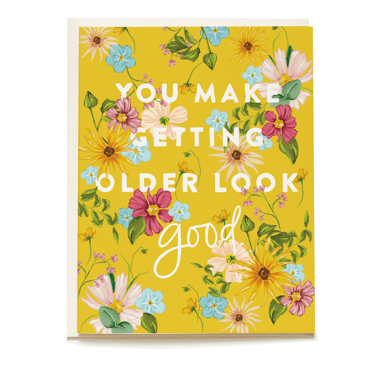 Yellow birthday card featuring floral designs and the text "You make getting older look good.