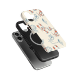 Mariner iPhone case featuring a lobster and seashell design on a cream background, with a black protective layer.