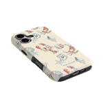 Mariner iPhone case featuring a cream background with colorful marine life illustrations, including crabs and shells.