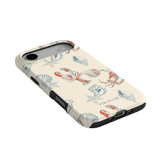 Mariner iPhone case featuring a cream background with colorful crab and shell illustrations.