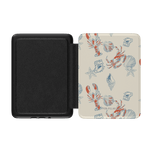 Mariner Kindle case with lobster and seashell patterns on a cream background, featuring a black interior.
