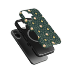 Meadow iPhone case featuring a floral pattern on a dark green background, layered over two black phone cases.