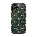 Meadow iPhone case featuring a dark green floral pattern with pink flowers and gold accents.