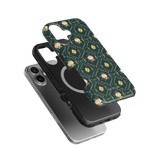 Meadow iPhone case featuring a floral design on a dark green background with a slim profile and textured finish.