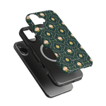 Meadow iPhone case featuring a floral design on a dark green background, layered over a black phone.