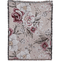 Meadow woven blanket featuring a floral design with roses and daisies in soft pink and cream tones.