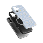 Merrigold iPhone case featuring a light blue floral design, stacked with a black and silver phone case.